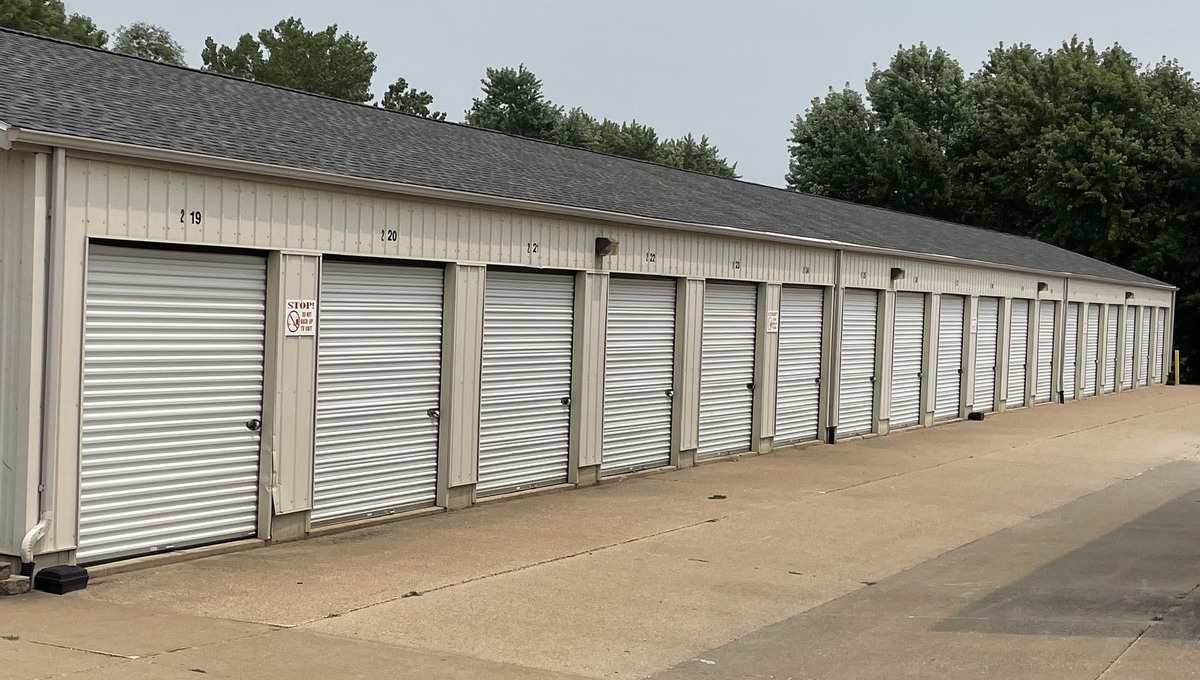 rows of drive-up self-storage units at an existing facility for sale